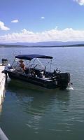 boat at the dock, fishing machine.